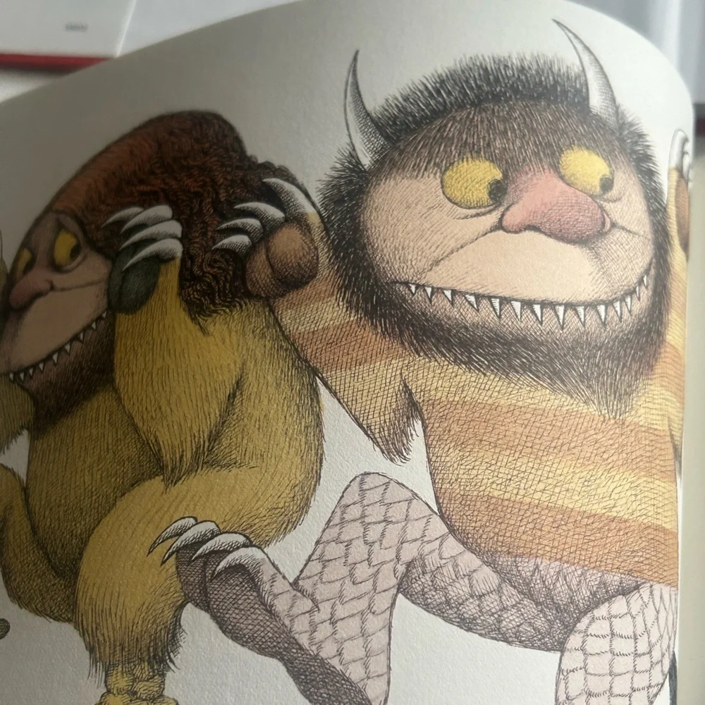 Set of 2 Where the Wild things Are Book & Who wants a cheap rhinoceros Hardback